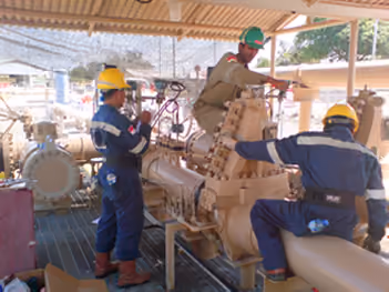 KEI crew working on a metering skid at a plant site
